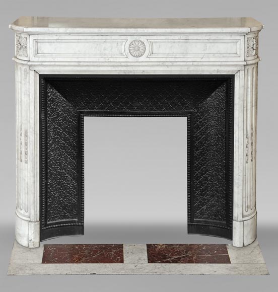 Louis XVI style Carrara marble mantel with rounded corners adorned with a sunflower flower-0