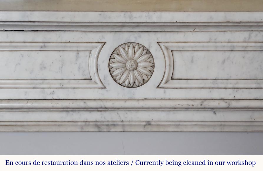 Louis XVI style Carrara marble mantel with rounded corners adorned with a sunflower flower-1