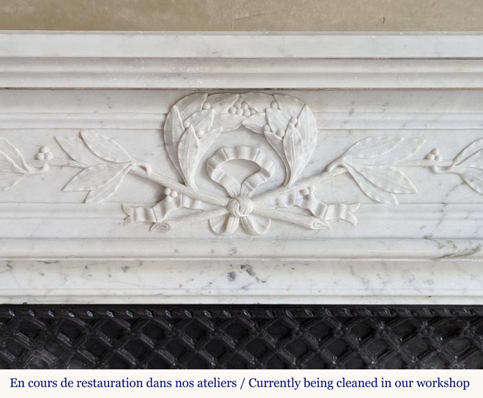 Louis XVI style mantel in Carrara marble adorned with a laurel wreath-1