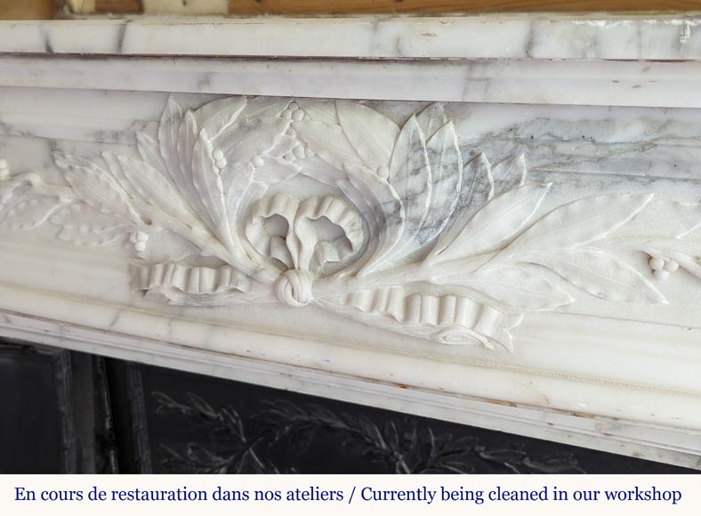 Louis XVI style Arabescato marble mantel with curved entablature decorated with a laurel wreath-2