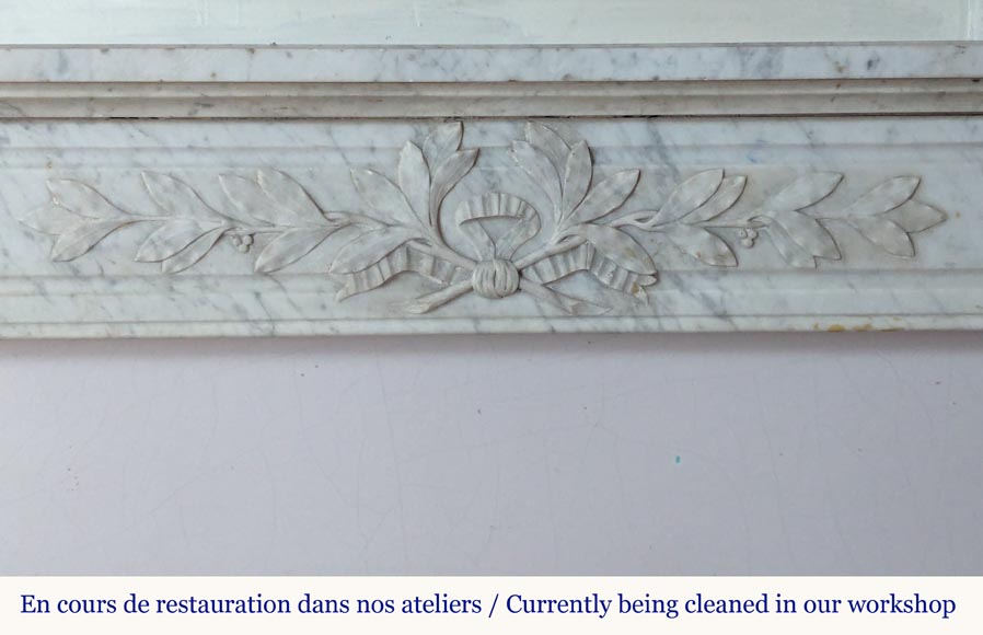 Louis XVI style mantel in Carrara marble adorned with a laurel wreath-1