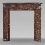 Louis XVI style mantel in Rouge du Nord marble