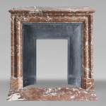 Louis XIV style fireplace in Rouge du Nord marble