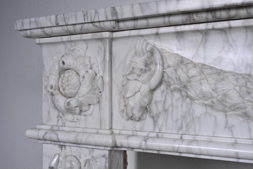 Louis XVI period mantel adorned with a garland carved in antique veined Carrara marble-4