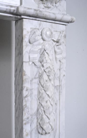 Louis XVI period mantel adorned with a garland carved in antique veined Carrara marble-12