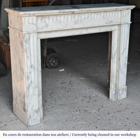 Louis XVI style mantel in semi-statuary marble decorated with curved flutes-1