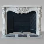 Louis XV style mantel in richly carved Carrara marble