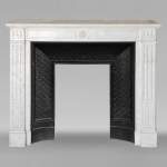 Louis XVI style mantel in Carrara marble adorned with a sunflower flower