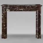 Louis XIV style mantel in Rouge du Nord marble