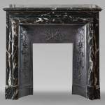 Louis XIV style mantel in black Marquina marble