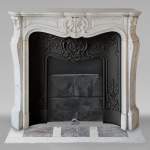 Carved Carrara marble Louis XV style mantel decorated with shells