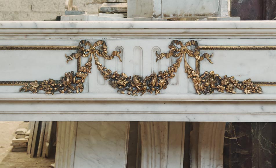 Louis XVI style semi-statuary marble mantel decorated with bronze garlands-1