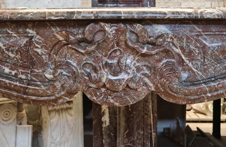 Louis XV style mantel in Rouge Royal marble with asymmetrical shell motif-1