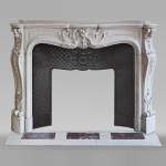 Louis XV style mantel richly carved in Carrara marble