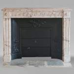 Louis XVI style mantel decorated with a Greek frieze carved in onyx