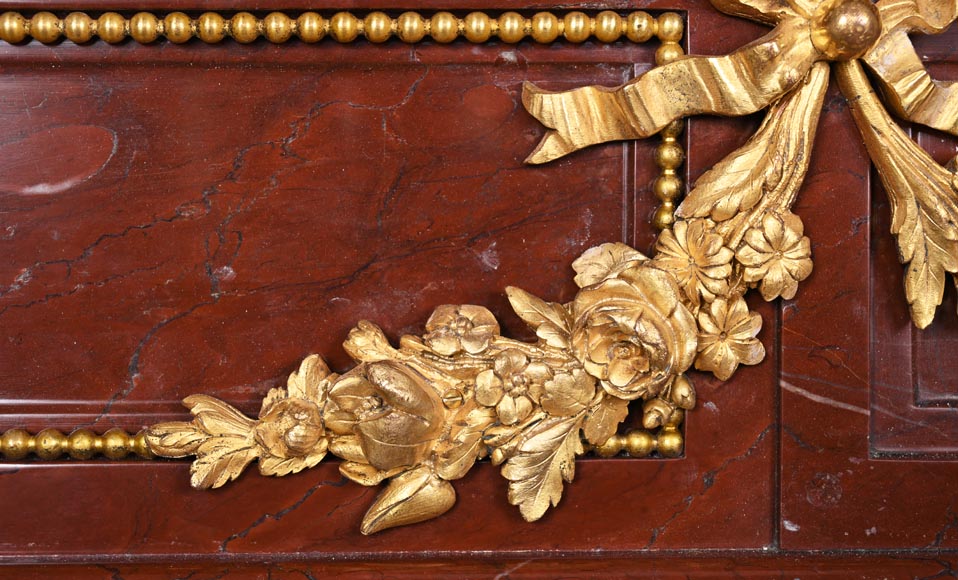 Louis XVI style fireplace in Antique Red marble, with bronze mounts, decorated with a garland-3