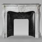 Louis XV style mantel with three shells carved in Carrara marble