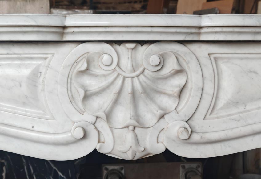 Louis XV style mantel with three shells carved in Carrara marble-1