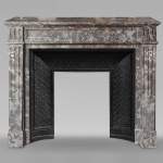 Louis XVI style molded marble mantel in Jourdan wood