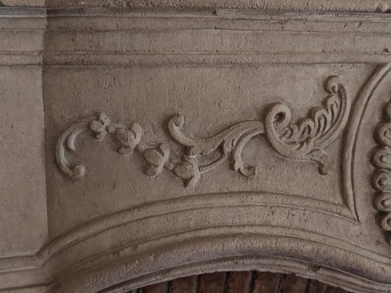 Louis XV period stone mantel with carved overmantel-11