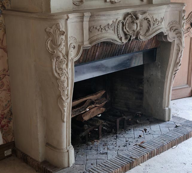 Louis XV period stone mantel with carved overmantel-13