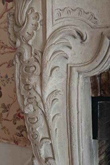 Louis XV period stone mantel with carved overmantel-15