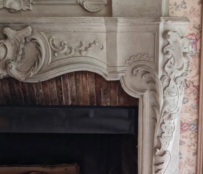 Louis XV period stone mantel with carved overmantel-18