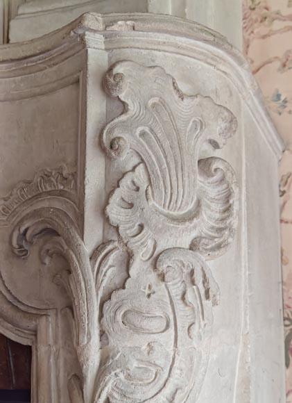 Louis XV period stone mantel with carved overmantel-19