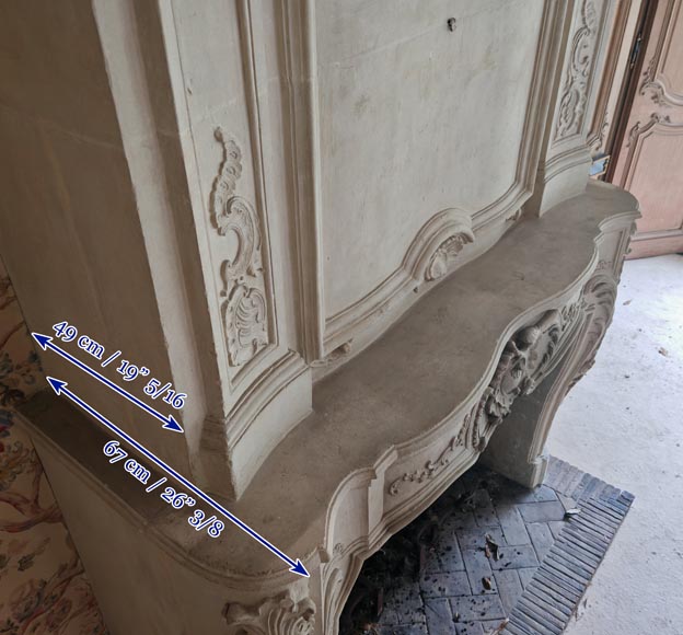 Louis XV period stone mantel with carved overmantel-21