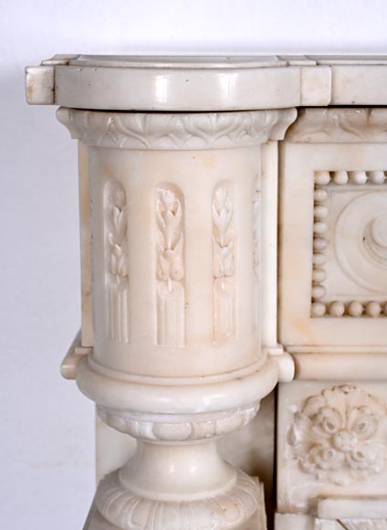 Louis XVI style white marble fireplace with rounded columns and female profile medallion-7