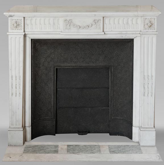 Louis XVI style semi-statuary marble mantel adorned with a frieze of flowers-0