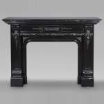 Napoleon III style two-tone mantel carved in fine black and Vert de Mer marble