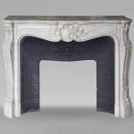 Louis XV style Carrara marble mantel with asymmetrical shell motif