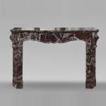 LXV style mantel carved in Levento marble