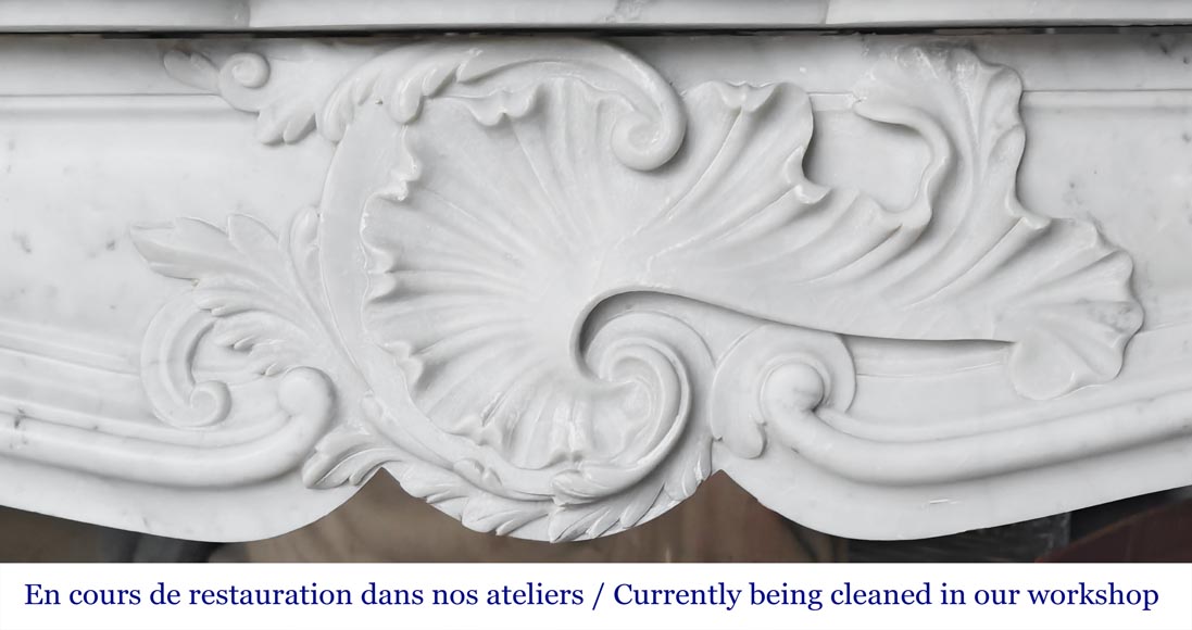 Louis XV style fireplace with an asymmetrical shell, in Carrara marble-1