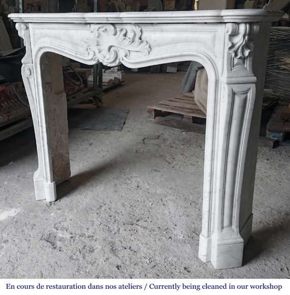 Louis XV style fireplace with an asymmetrical shell, in Carrara marble-7