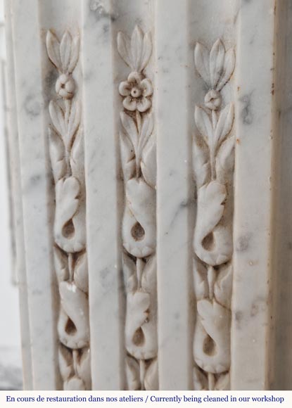 Louis XVI style fireplace in Carrare marble, decorated with floral fluting-5