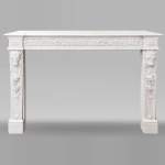 Napoleon III style fireplace in statuary marble, decorated with fruit and a goat's head