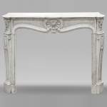 Louis XV style fireplace in Carrara marble decorated with a shell