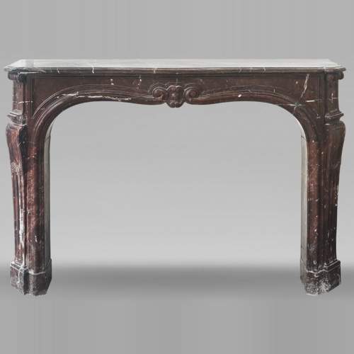 Louis XV period fireplace in Griotte marble