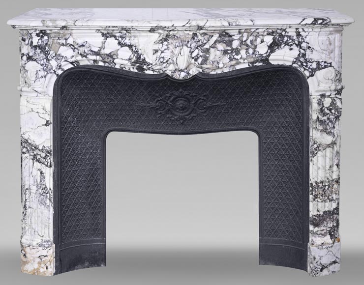 Regency style fireplace in purple breccia, decorated with a large shell-0