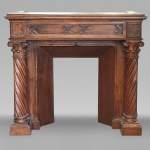 Neo-Renaissance style walnut fireplace with Corinthian column