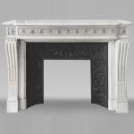 Louis XVI style fireplace in Carrara marble, decorated with pearls and macaroons