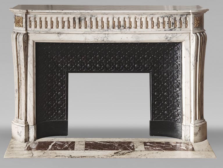 Curved Louis XVI style fireplace in veined marble, with bronze asparagus decoration-0