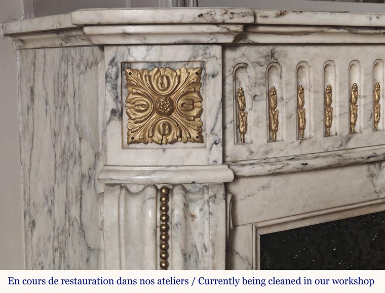 Curved Louis XVI style fireplace in veined marble, with bronze asparagus decoration-4