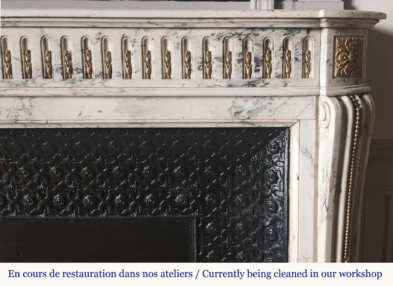 Curved Louis XVI style fireplace in veined marble, with bronze asparagus decoration-7