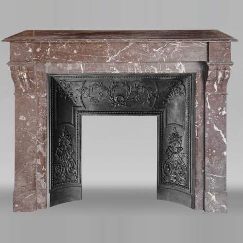 Napoleon III style fireplace with modillion in Rouge du Nord marble