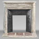 Louis XVI style fireplace with rounded corner, in Médous breccia