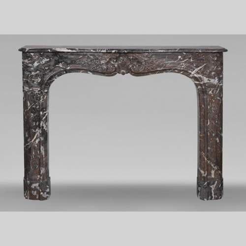 Louis XV period fireplace in red Rance marble