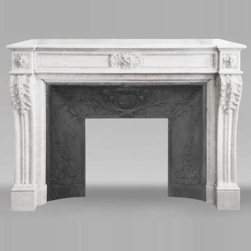 Louis XVI style fireplace in Carrara marble decorated with pearls